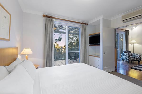Oaks Cypress Lakes Resort 1 Bedroom Villa Bedroom 2 600x400px.jpg